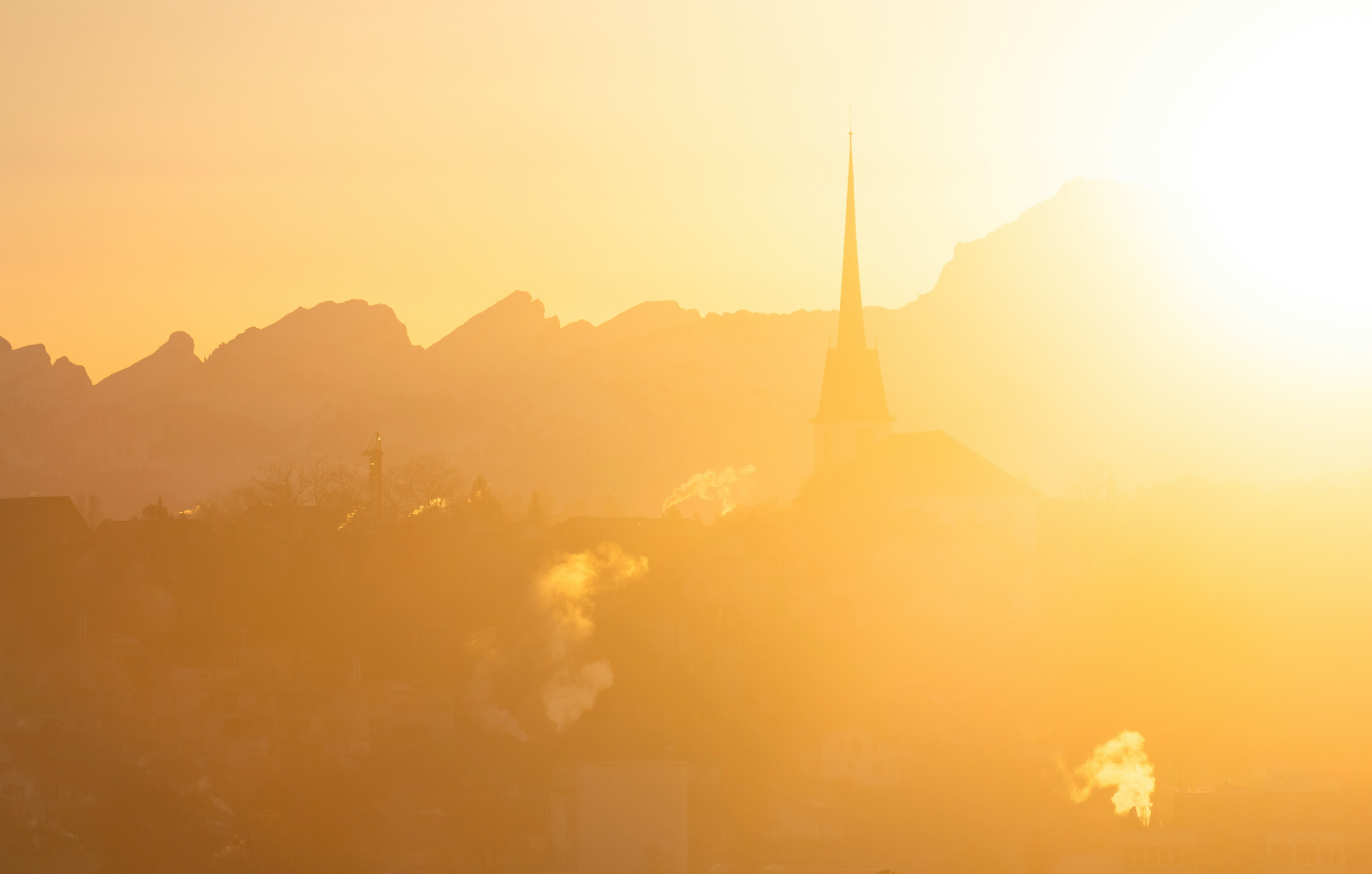 silhouette of building during sunset